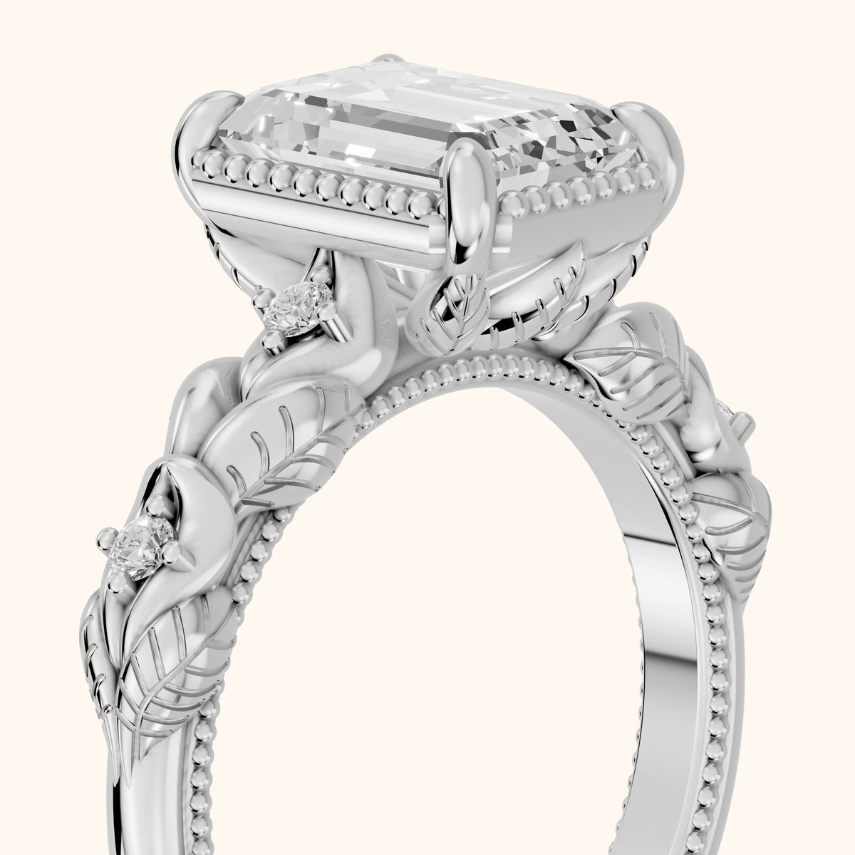 Pelham Vintage Leaf Emerald Diamond Engagement Ring in Platinum - slant-view.webp