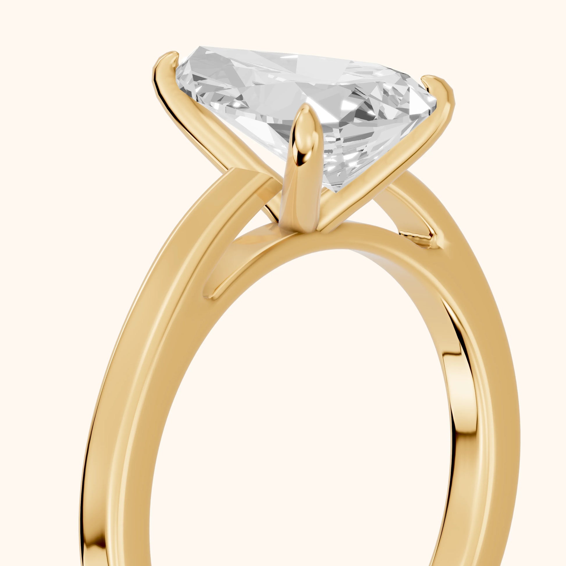 Kaia Solitaire Pear Diamond Ring in Yellow Gold - slant-view.webp