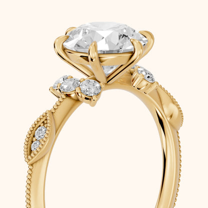Naomi Vintage Milgrain Round Diamond Engagement Ring in Yellow Gold - slant-view.webp