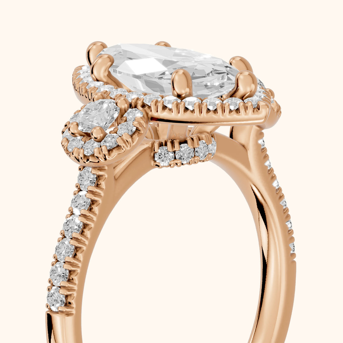 Denver Three-Stone Halo Marquise Diamond Engagement Ring in Rose Gold - slant-view.webp