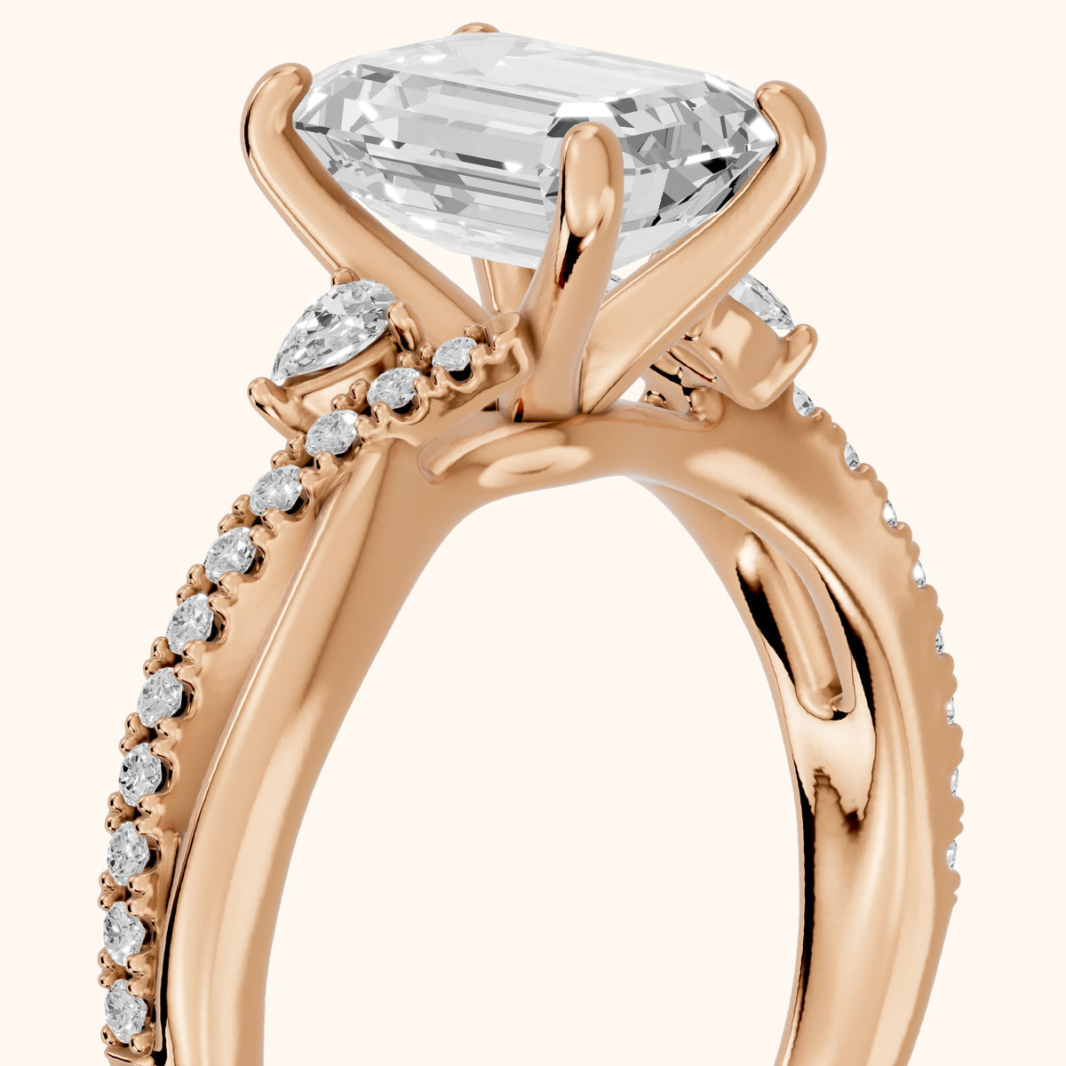 Reno Pear-Side Twist Emerald Diamond Engagement Ring in Rose Gold - slant-view.webp