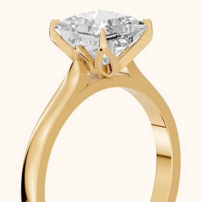 Isabella Bloom Solitaire Princess Diamond Engagement Ring in Yellow Gold - slant-view.webp