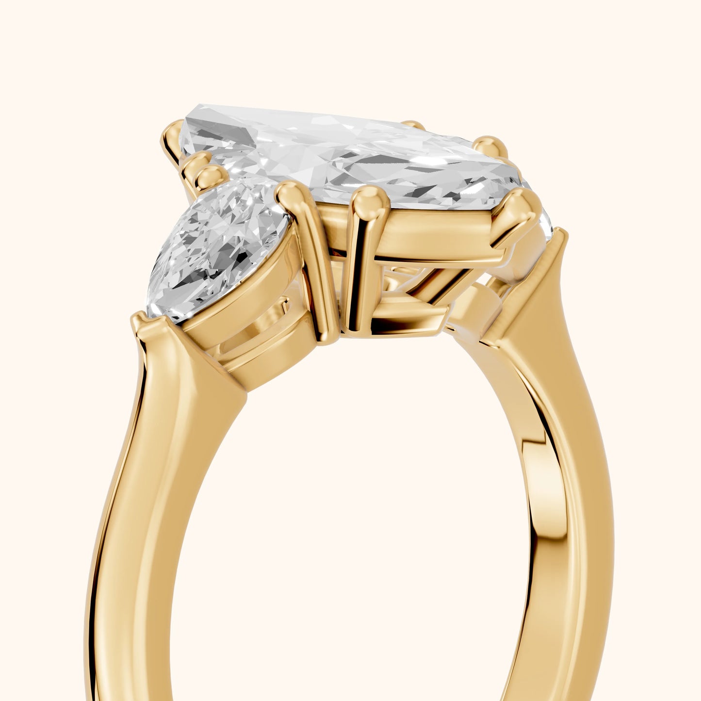 Mirabel Three-Stone Marquise Diamond Engagement Ring in Yellow Gold - slant-view.webp