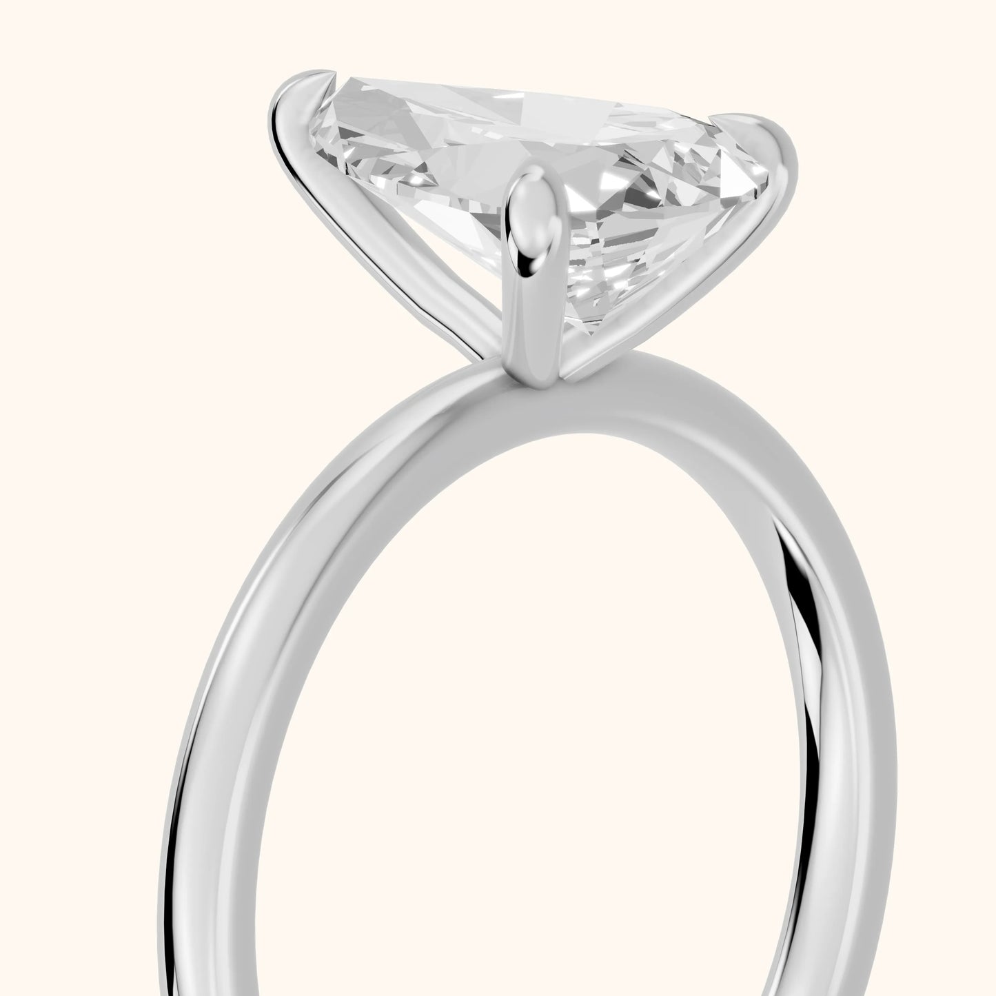 Nella Petite Solitaire Pear Diamond Engagement Ring in Silver - slant-view.webp