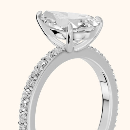 Aisha Pavé Solitaire Pear Diamond Engagement Ring in Platinum - slant-view.webp