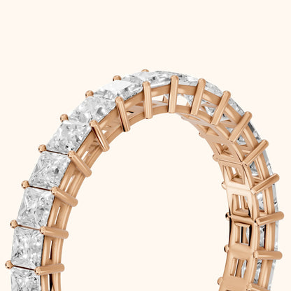 Manon Shared Prong Princess Diamond Eternity Band in Rose Gold - slant-view