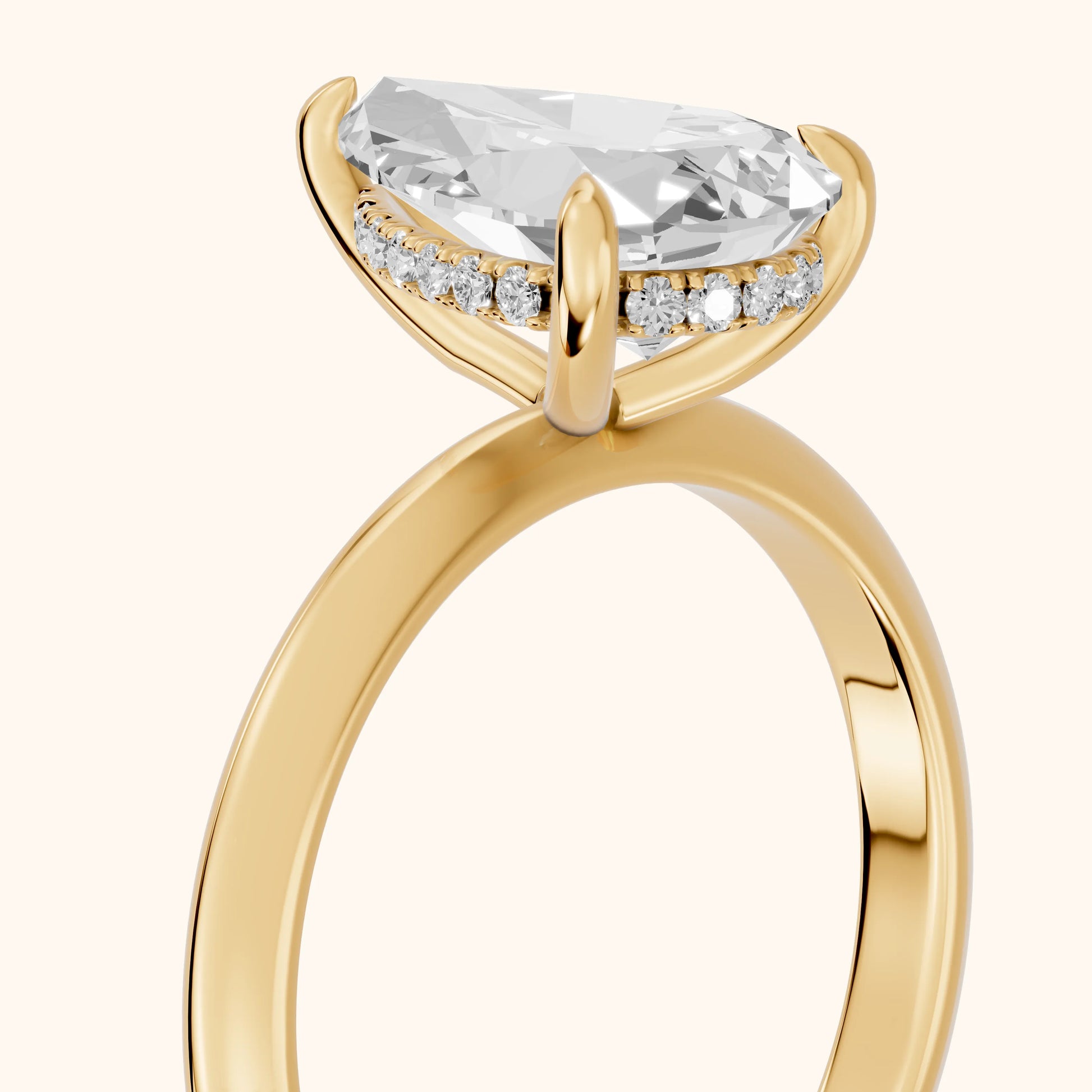 Amaya Hidden Halo Pear Diamond Ring in Yellow Gold - slant-view.webp