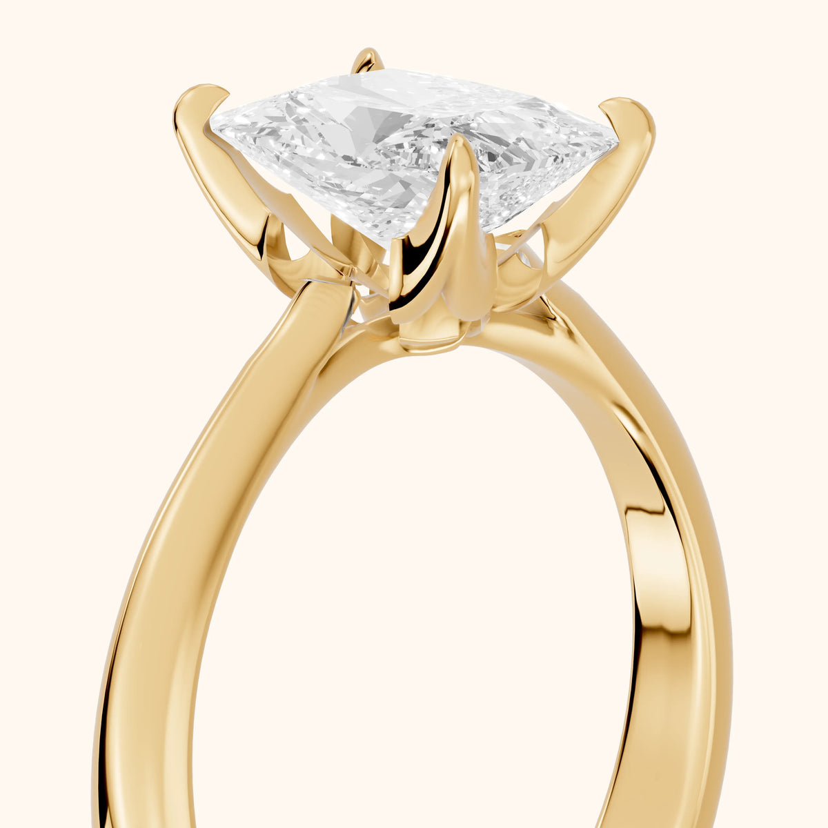 Evie Solitaire Six-Prong Radiant Diamond Engagement Ring in Yellow Gold - slant-view.webp