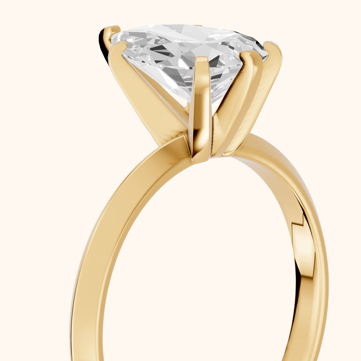 Verity Solitaire Knife Edge Pear Diamond Engagement Ring in Yellow Gold - slant-view.webp