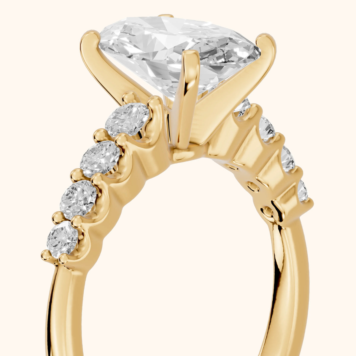 Augusta Graduated Pavé Oval Diamond Engagement Ring in Yellow Gold - slant-view.webp