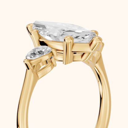 Faye Three-Stone Trellis Marquise Diamond Ring in Yellow Gold - slant-view.webp