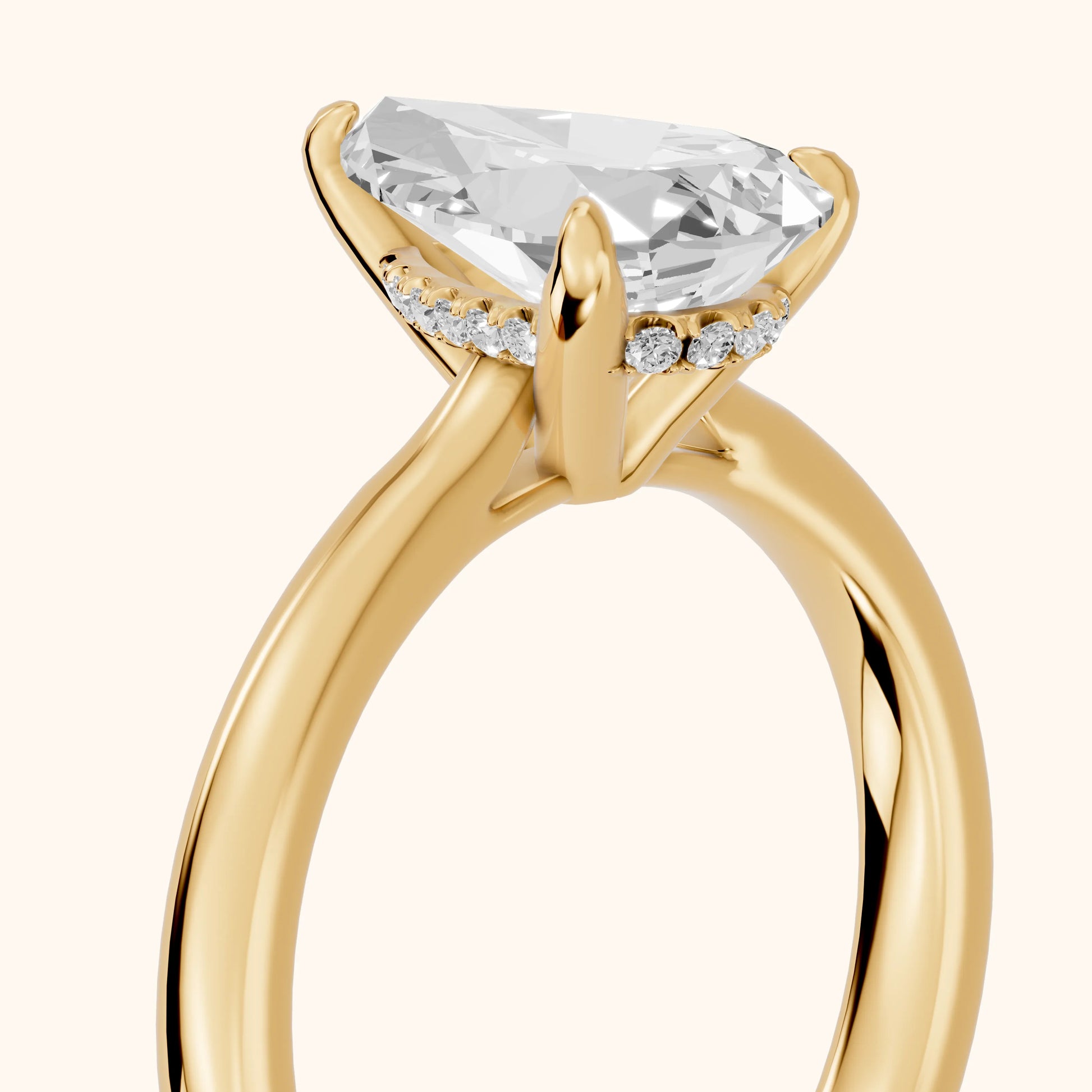 Mena Hidden Halo Pear Diamond Engagement Ring in Yellow Gold - slant-view.webp
