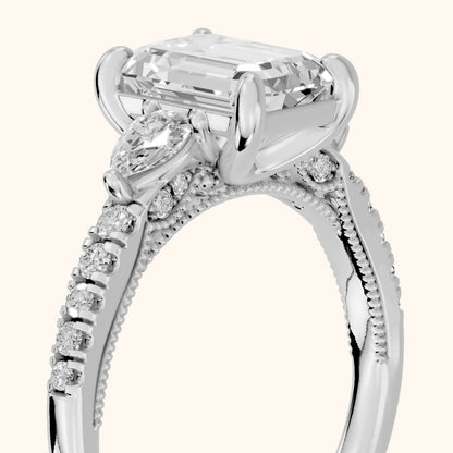 Weston Pear-Side Three-Stone Emerald Diamond Engagement Ring in Silver - slant-view.webp