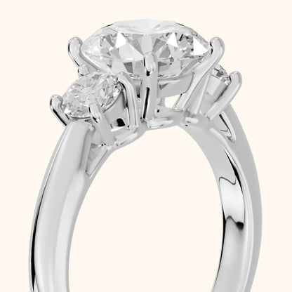 Zara Three-Stone Round Diamond Engagement Ring in White Gold - slant-view.webp