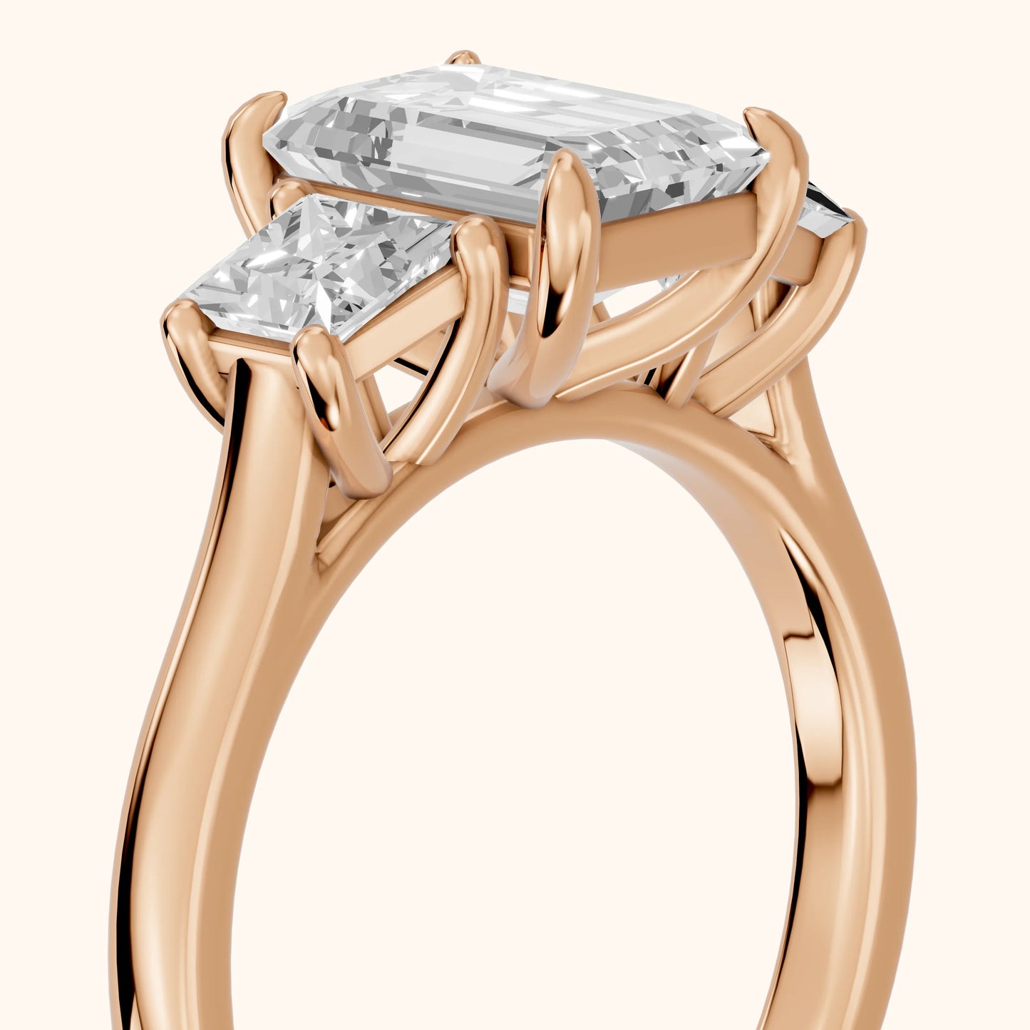 Sienna Three-Stone Emerald Diamond Ring in Rose Gold - slant-view.webp