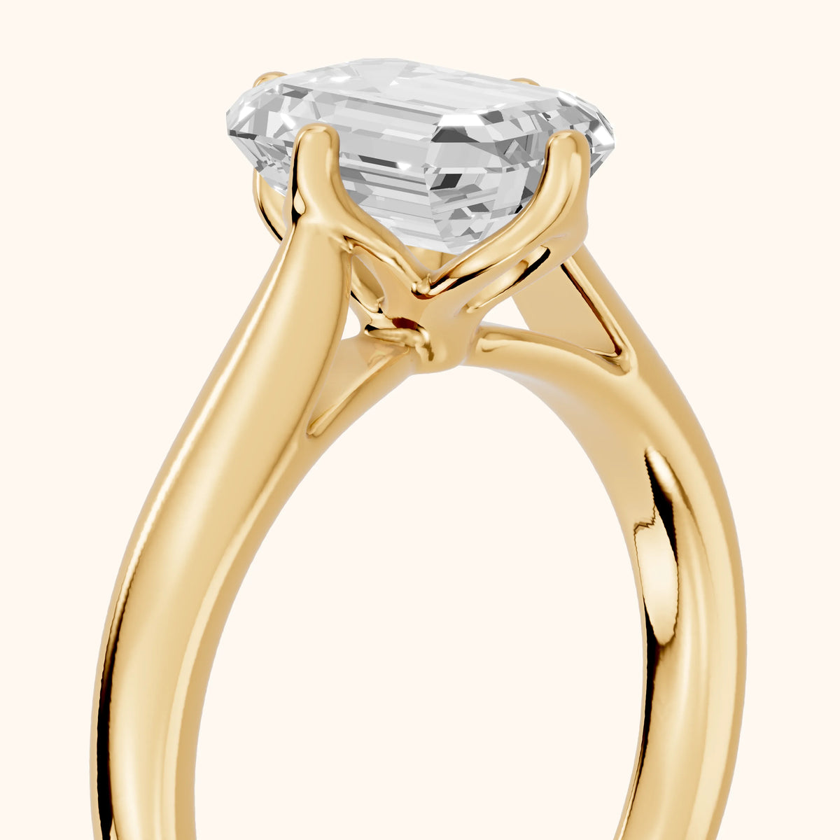Edwina Crossover Solitaire Emerald Diamond Engagement Ring in Yellow Gold - slant-view.webp