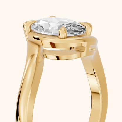Margaux Bypass Solitaire Oval Diamond Engagement Ring in Yellow Gold - slant-view.webp