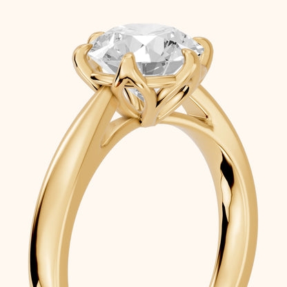 Lucia Solitaire Six-Prong Round Diamond Engagement Ring in Yellow Gold - slant-view.webp