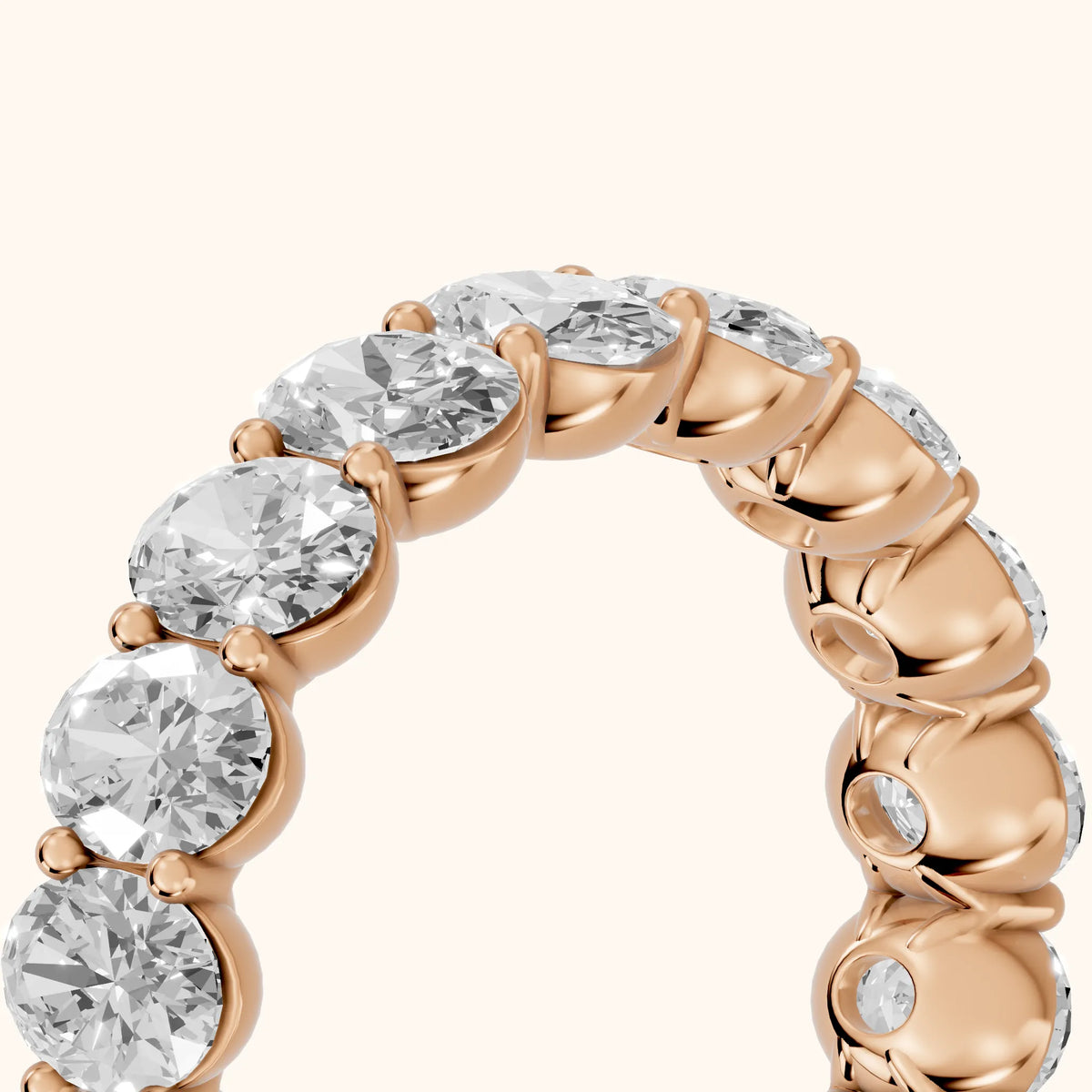 Neha Shared Prong Oval Diamond Eternity Band in Rose Gold - slant-view