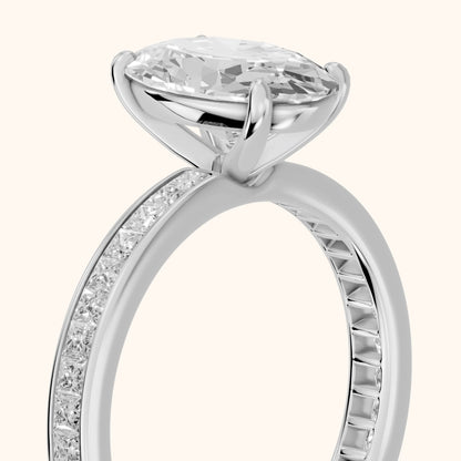 Brielle Channel Set Solitaire Oval Diamond Ring in Platinum - slant-view.webp