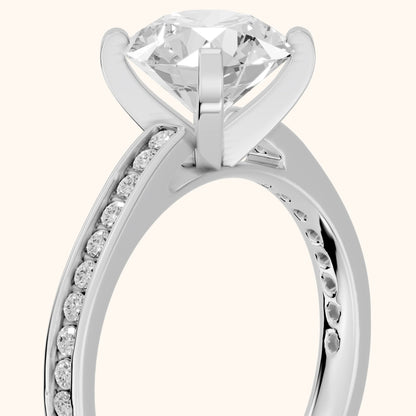 Tessa Solitaire Channel Set Round Diamond Engagement Ring in White Gold - slant-view.webp
