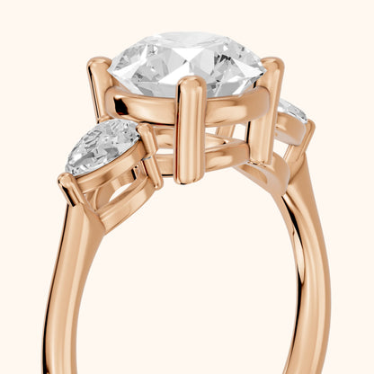 Faye Three-Stone Trellis Round Diamond Ring in Rose Gold - slant-view.webp
