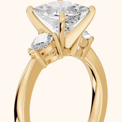 Amabel Three-Stone Princess Diamond Engagement Ring in Yellow Gold - slant-view.webp