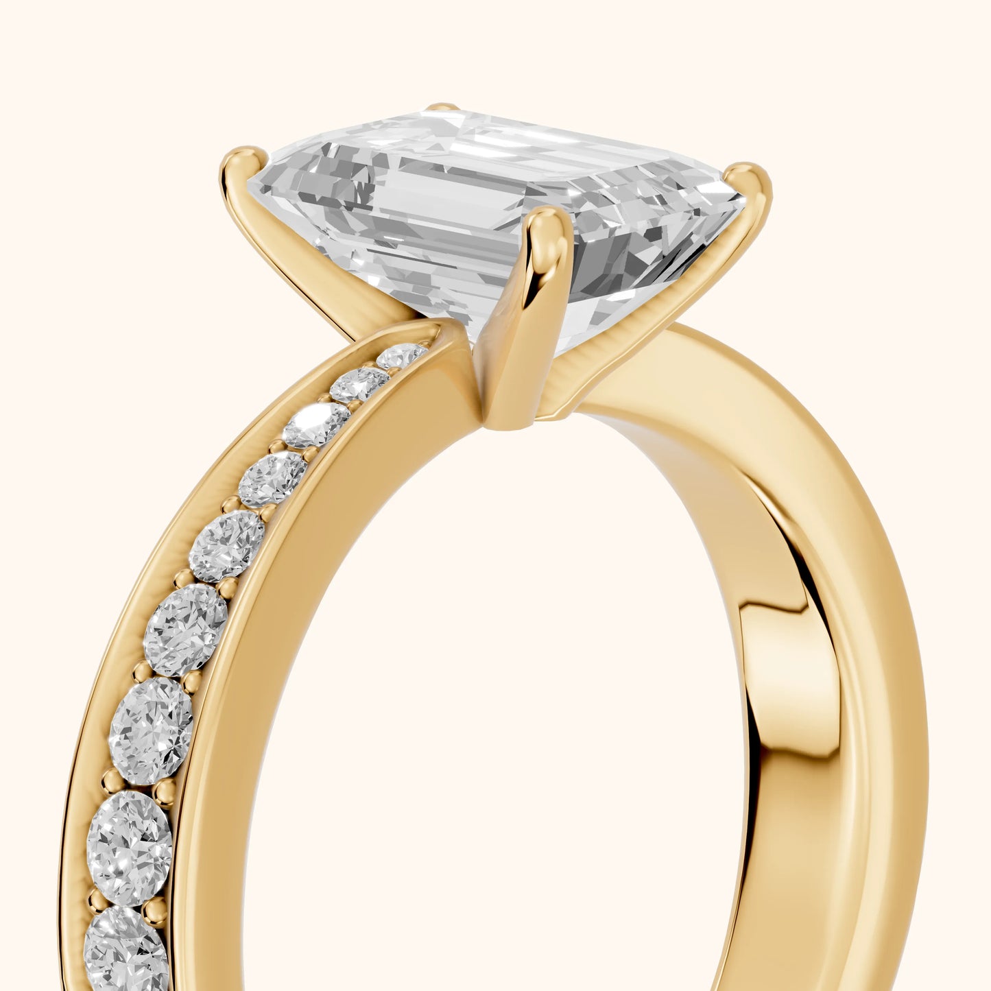 Rhea Sidestone Pavé Emerald Diamond Engagement Ring in Yellow Gold - slant-view.webp
