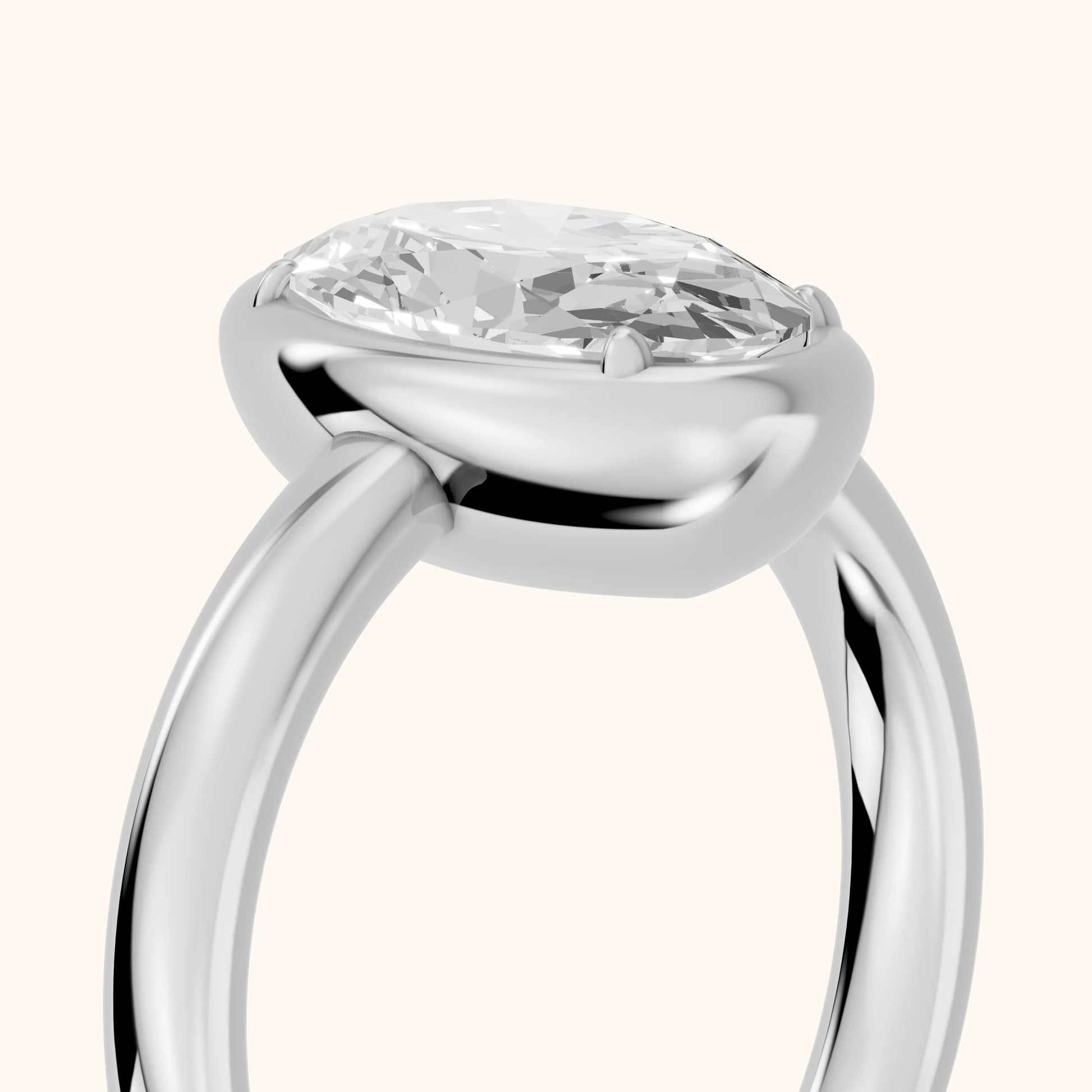 Alina Bezel Solitaire Oval Diamond Ring in White Gold - slant-view.webp
