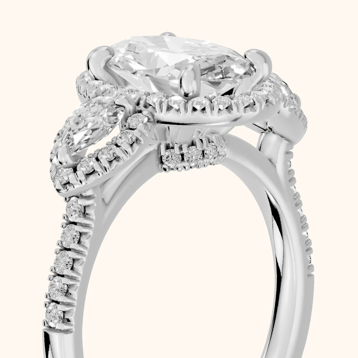 Camden Three-Stone Halo Oval Diamond Engagement Ring in White Gold - slant-view.webp