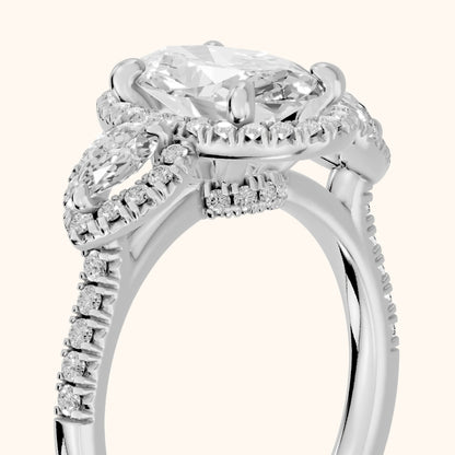 Camden Three-Stone Halo Oval Diamond Engagement Ring in White Gold - slant-view.webp