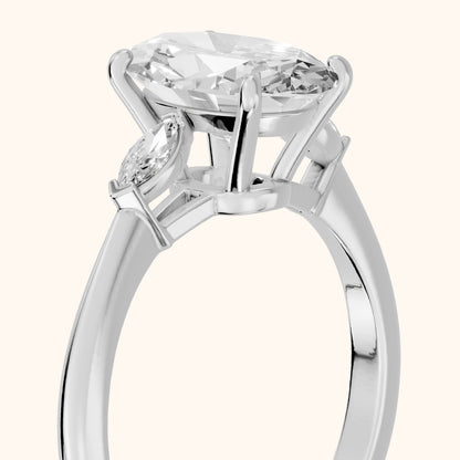 Lissa Marquise-Side Three-Stone Oval Diamond Engagement Ring in Platinum - slant-view.webp