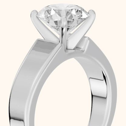 Susannah Wide Band Solitaire Round Diamond Engagement Ring in Silver - slant-view.webp