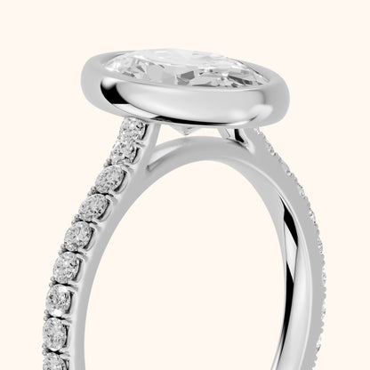 Cora Bezel Pavé Oval Diamond Ring in Platinum - slant-view.webp