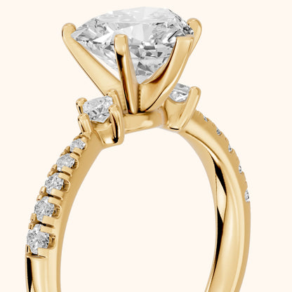Alethea Three-Stone Pavé Heart Diamond Engagement Ring in Yellow Gold - slant-view.webp