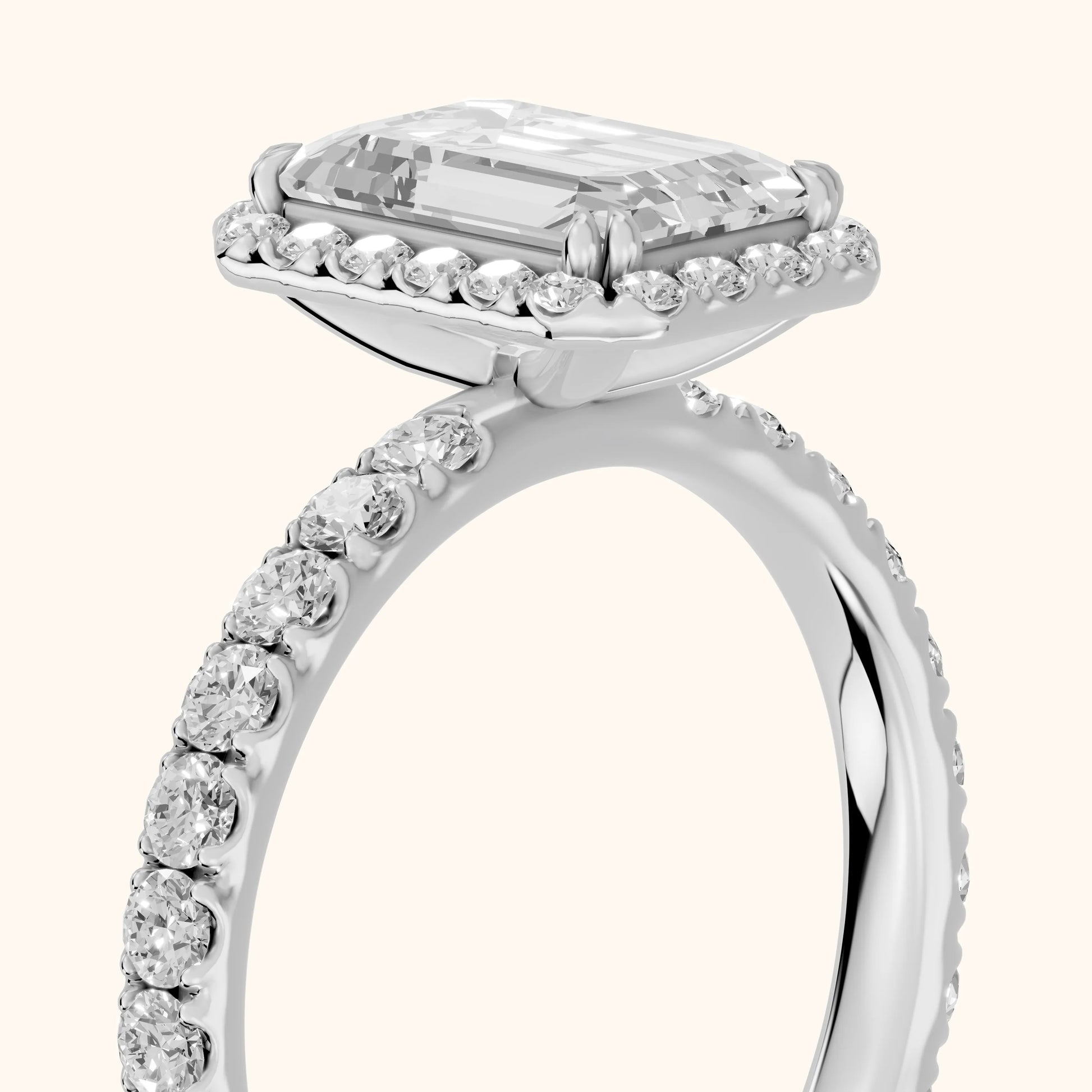 Chloe Halo Pavé Emerald Diamond Ring in Silver - slant-view.webp
