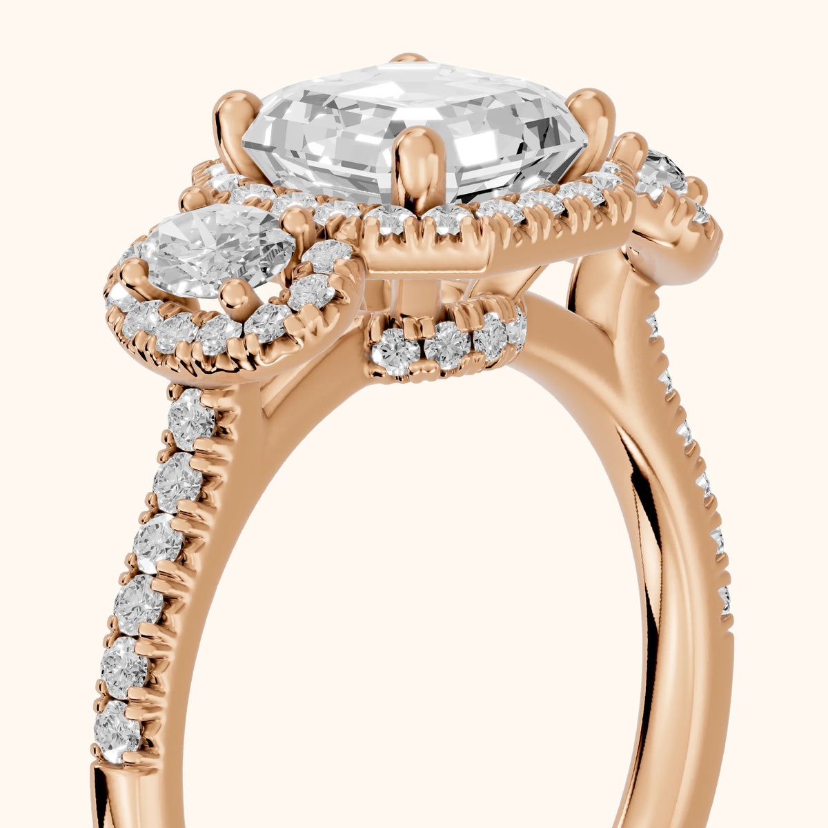 Austin Three-Stone Halo Asscher Diamond Engagement Ring in Rose Gold - slant-view.webp