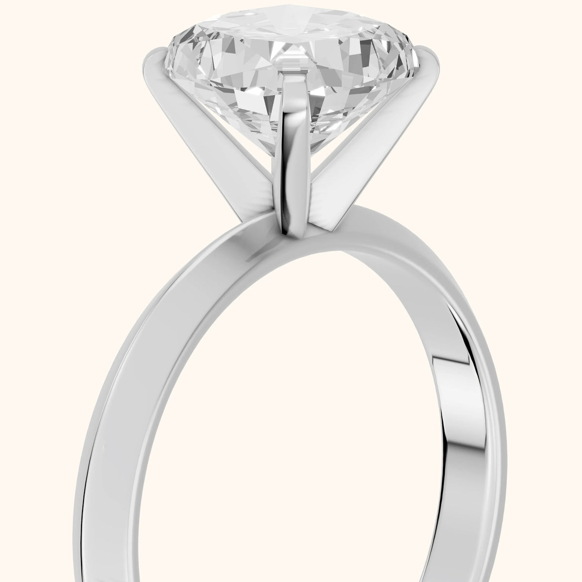 June Solitaire Knife Edge Cushion Diamond Engagement Ring in Platinum - slant-view.webp