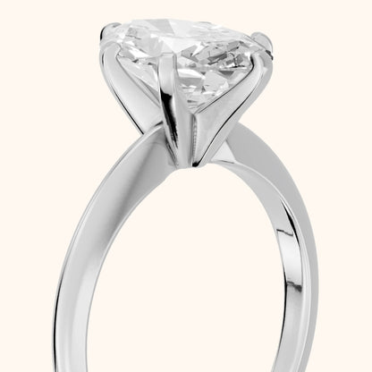 Aida Solitaire Knife Edge Oval Diamond Engagement Ring in Silver - slant-view.webp