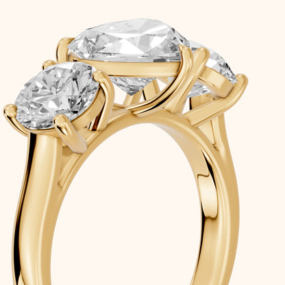 Esme Three-Stone Tapered Heart Diamond Ring in Yellow Gold - slant-view.webp