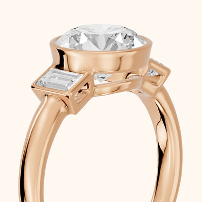 Paia Bezel Three-Stone Round Diamond Engagement Ring in Rose Gold - slant-view.webp
