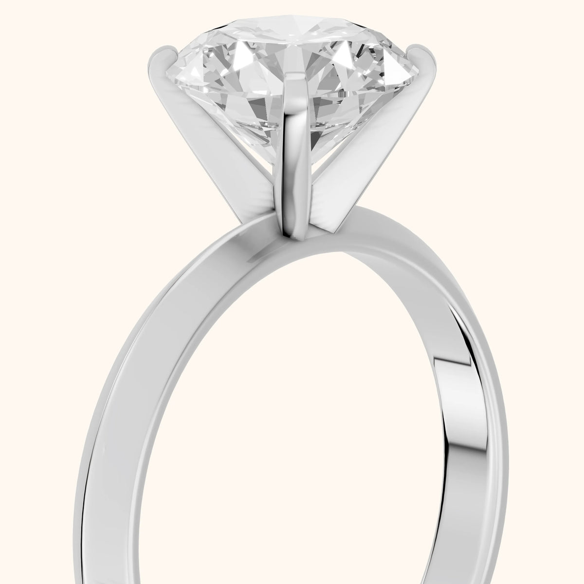 June Solitaire Knife Edge Round Diamond Engagement Ring in Silver - slant-view.webp
