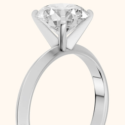 June Solitaire Knife Edge Round Diamond Engagement Ring in Silver - slant-view.webp