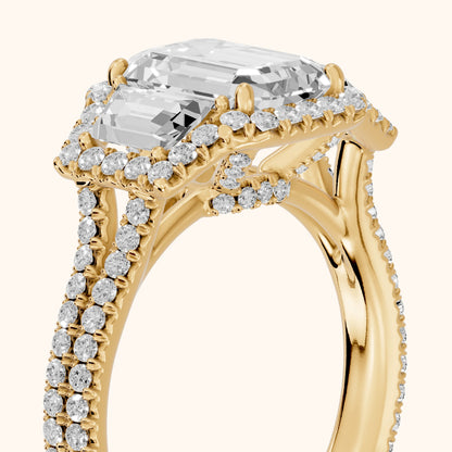 Oakley Three-Stone Split Shank Emerald Diamond Engagement Ring in Yellow Gold - slant-view.webp