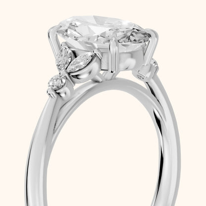 Eve Leaf Cluster Oval Diamond Engagement Ring in Platinum - slant-view.webp