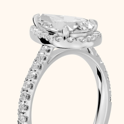 Amara Halo Claw Prong Pear Diamond Ring in White Gold - slant-view.webp