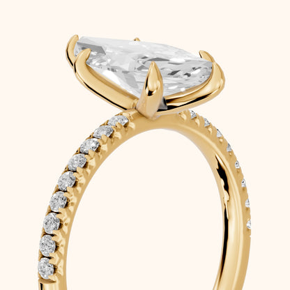 Ione Solitaire Pavé Marquise Diamond Engagement Ring in Yellow Gold - slant-view.webp