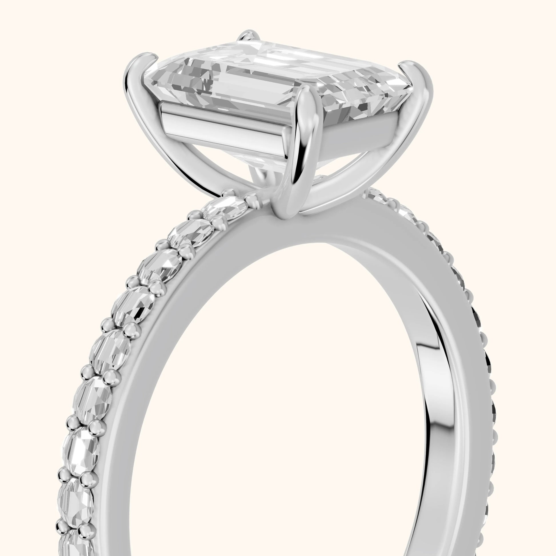 Aisha Pavé Solitaire Emerald Diamond Engagement Ring in Platinum - slant-view.webp