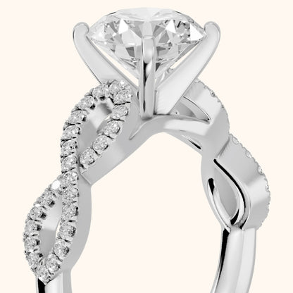 Althea Twist Micropavé Round Diamond Engagement Ring in Platinum - slant-view.webp