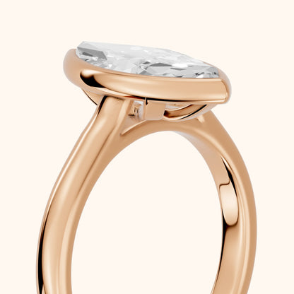 Jolie Bezel Solitaire Marquise Diamond Engagement Ring in Rose Gold - slant-view.webp